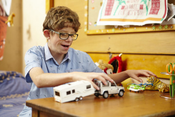 Boy playing with toys