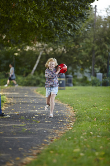 Girl running in a park